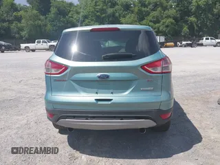 2013 Ford Escape SE with VIN 1FMCU9G98DUB92921, listed as a IAAI auction lot 42618998 with 135,497 mi miles and . Bid and sale history available at DreamBid. Image 16.