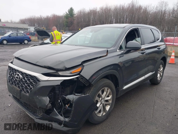 2020 Hyundai Santa Fe SE with VIN 5NMS2CAD8LH258275, listed as a IAAI auction lot 41912687 with 80,467 mi miles and . Bid and sale history available at DreamBid. Image 2.