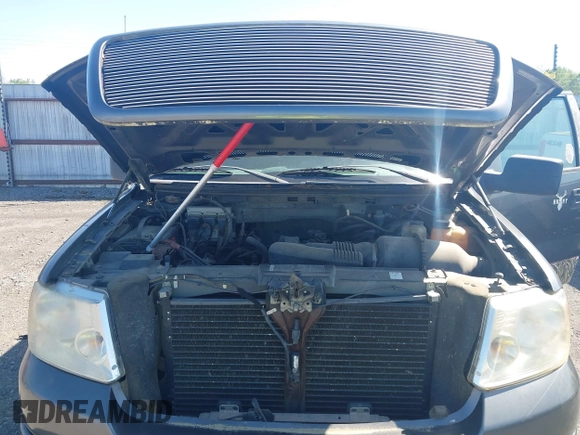2007 Ford F-150 STX with VIN 1FTRX14W47FA54576, listed as a IAAI auction lot 41971521 with 220,945 mi miles. Bid and sale history available at carsss.com. Image 10.