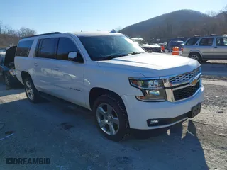 2020 Chevrolet Suburban LT with VIN 1GNSKHKC0LR228452, listed as a IAAI auction lot 41376496 with 89,747 mi miles. Bid and sale history available at carsss.com. Image 1.