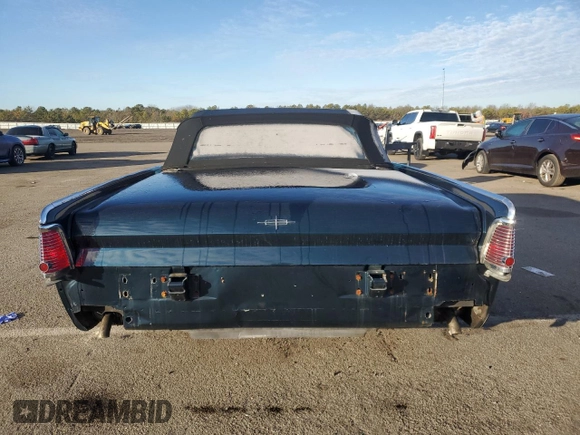 1965 Lincoln Continental with VIN 5Y86N428064, listed as a Copart auction lot 76812744 with 15,659 mi miles and Salvage Title. Bid and sale history available at DreamBid. Image 6.