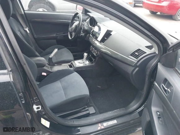 2010 Mitsubishi Lancer GTS with VIN JA32X8HWXAU004111, listed as a IAAI auction lot 41563303 with 198,931 mi miles. Bid and sale history available at carsss.com. Image 5.