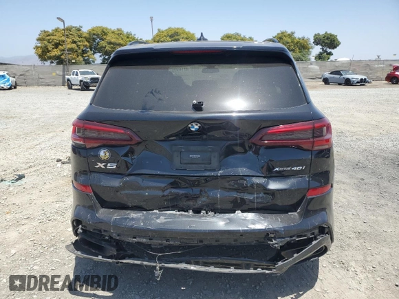 2021 BMW X5 xDrive40i with VIN 5UXCR6C03M9H41831, listed as a Copart auction lot 62145025 with Not provided miles and Salvage title. Bid and sale history available at DreamBid. Image 6.