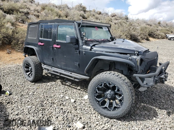 2010 Jeep Wrangler Unlimited Sahara with VIN 1J4HA5H13AL182071, listed as a Copart auction lot 51696665 with 178,026 mi miles and Salvage Title. Bid and sale history available at carsss.com. Image 4.