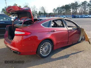 2014 Ford Fusion Titanium with VIN 3FA6P0K97ER145700, listed as a IAAI auction lot 42056362 with 122,000 mi miles. Bid and sale history available at carsss.com. Image 4.