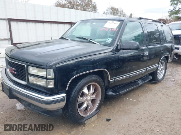 1998 GMC Yukon with VIN 1GKEC13R8WJ711255, listed as a IAAI auction lot 41457304 with 291,211 mi miles. Bid and sale history available at carsss.com. Image 17.
