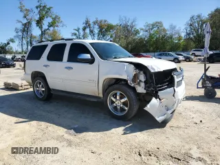 2014 Chevrolet Tahoe LT with VIN 1GNSCBE08ER192587, listed as a Copart auction lot 49216975 with 178,595 mi miles and Salvage title. Bid and sale history available at DreamBid. Image 4.