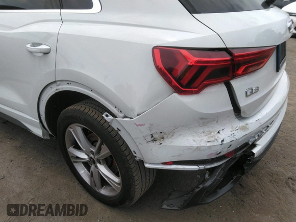 2022 Audi Q3 S line Premium Plus with VIN WA1EECF31N1045258, listed as a IAAI auction lot 42299558 with 19,332 mi miles and . Bid and sale history available at DreamBid. Image 6.
