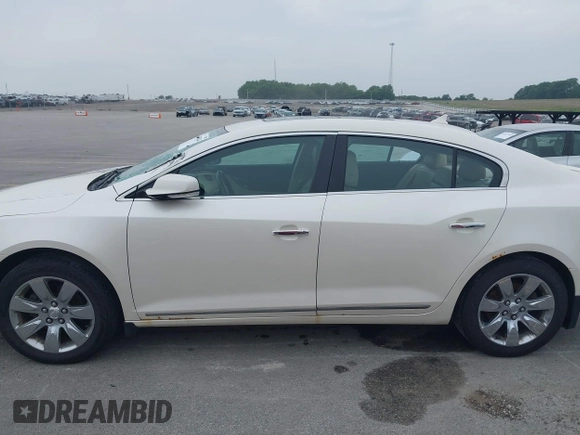 2013 Buick LaCrosse Leather with VIN 1G4GC5E3XDF207001, listed as a IAAI auction lot 42432746 with 249,000 mi miles and . Bid and sale history available at DreamBid. Image 14.