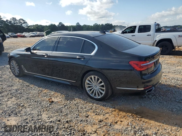 2017 BMW 7 Series 740i with VIN WBA7E2C57HG739482, listed as a Copart auction lot 53652145 with 102,418 mi miles and Salvage title. Bid and sale history available at DreamBid. Image 2.