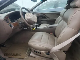 1995 Mercury Cougar z VIN 1MELM62W3SH605641, wystawiony jako Copart lot #84732824 z przebiegiem 40 675 mil mil oraz Szkody całkowita. Historia ofert i sprzedaży dostępna na DreamBid. Obrazek 7.