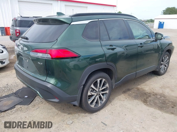 2023 Toyota Corolla Cross XLE with VIN 7MUEAAAG9PV053569, listed as a IAAI auction lot 42319709 with 71,105 mi miles and . Bid and sale history available at DreamBid. Image 4.