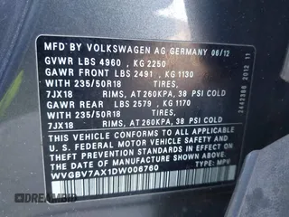 2013 Volkswagen Tiguan SE z VIN WVGBV7AX1DW006760, wystawiony jako IAAI lot #41563994 z przebiegiem 167 044 mil mil oraz . Historia ofert i sprzedaży dostępna na DreamBid. Obrazek 9.
