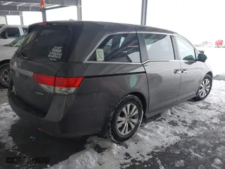 2016 Honda Odyssey SE with VIN 5FNRL5H32GB155946, listed as a IAAI auction lot 41590237 with 140,167 mi miles. Bid and sale history available at carsss.com. Image 4.