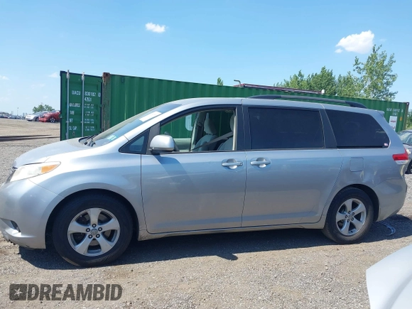 2011 Toyota Sienna LE AAS with VIN 5TDKK3DC2BS096965, listed as a IAAI auction lot 42583783 with 288,489 mi miles and . Bid and sale history available at DreamBid. Image 14.