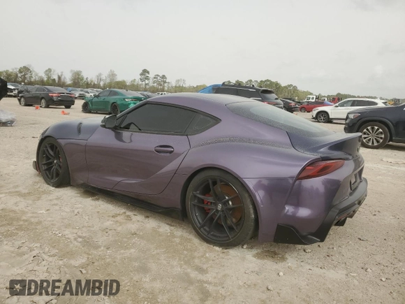 2022 Toyota Supra 3.0 z VIN WZ1DB0C03NW050968, wystawiony jako Copart lot #44450175 z przebiegiem 22 420 mil mil oraz Szkoda całkowita • Salvage title. Historia ofert i sprzedaży dostępna na DreamBid. Obrazek 2.
