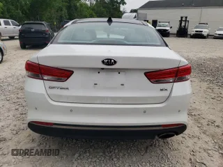 2016 Kia Optima EX z VIN 5XXGU4L3XGG091612, wystawiony jako Copart lot #59929295 z przebiegiem 130 450 mil mil oraz Szkoda całkowita • Salvage title. Historia ofert i sprzedaży dostępna na DreamBid. Obrazek 6.