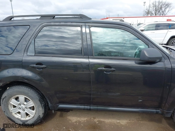2011 Mercury Mariner with VIN 4M2CN8B7XBKJ01717, listed as a IAAI auction lot 42030587 with 115,766 mi miles. Bid and sale history available at carsss.com. Image 13.