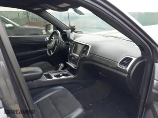 2018 Jeep Grand Cherokee Laredo E with VIN 1C4RJFAG4JC464783, listed as a IAAI auction lot 41664453 with 106,466 mi miles. Bid and sale history available at carsss.com. Image 5.