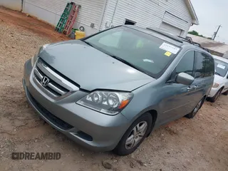 2005 Honda Odyssey EX-L with VIN 5FNRL38735B031513, listed as a IAAI auction lot 42197247 with 276,584 mi miles and . Bid and sale history available at DreamBid. Image 2.