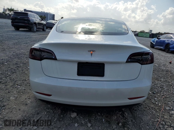 2023 Tesla Model 3 z VIN 5YJ3E1EAXPF422956, wystawiony jako Copart lot #52500285 z przebiegiem 24 082 mil mil oraz Nie do naprawy • Non repairable. Historia ofert i sprzedaży dostępna na DreamBid. Obrazek 6.