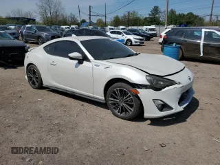 2014 Scion FR-S with VIN JF1ZNAA13E9704420, listed as a Copart auction lot 54262645 with 70,682 mi miles and Clean Title. Bid and sale history available at DreamBid. Image 4.