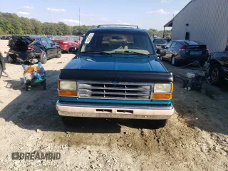1994 Ford Explorer Eddie Bauer z VIN 1FMDU32X9RUE56887, wystawiony jako Copart lot #74450034 z przebiegiem 230 080 mil mil oraz Szkody całkowita. Historia ofert i sprzedaży dostępna na DreamBid. Obrazek 5.