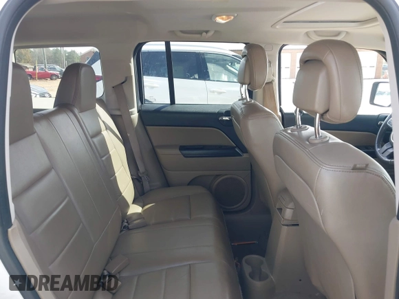 2014 Jeep Patriot High Altitude with VIN 1C4NJPFA6ED663066, listed as a IAAI auction lot 41709104 with 115,988 mi miles and . Bid and sale history available at carsss.com. Image 8.