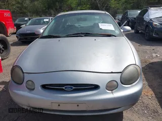 1999 Ford Taurus SE with VIN 1FAFP53U2XA322747, listed as a IAAI auction lot 41817160 with 230,319 mi miles. Bid and sale history available at carsss.com. Image 6.