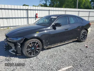 2023 BMW i4 M50 z VIN WBY33AW07PFN49265, wystawiony jako Copart lot #52011255 z przebiegiem 165 187 mil mil oraz Szkody całkowita. Historia ofert i sprzedaży dostępna na DreamBid. Obrazek 1.