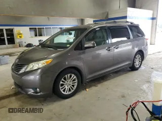 2013 Toyota Sienna XLE AAS with VIN 5TDYK3DC3DS354214, listed as a Copart auction lot 64464225 with 217,661 mi miles and Salvage title. Bid and sale history available at DreamBid. Image 1.