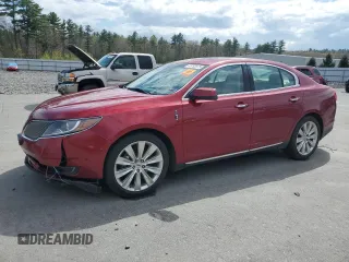2013 Lincoln MKS EcoBoost with VIN 1LNHL9FT1DG609011, listed as a Copart auction lot 55793575 with Not provided miles and Salvage title. Bid and sale history available at DreamBid. Image 1.