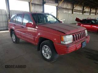1998 Jeep Grand Cherokee Limited with VIN 1J4GZ78Y0WC294461, listed as a Copart auction lot 69477664 with 209,295 mi miles and Clean Title. Bid and sale history available at carsss.com. Image 4.