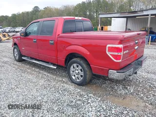 2012 Ford F-150 XL with VIN 1FTFW1CT3CKE02267, listed as a IAAI auction lot 41868205 with 199,958 mi miles. Bid and sale history available at carsss.com. Image 3.