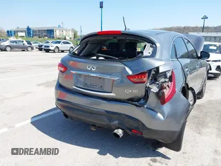 2015 Infiniti QX70 with VIN JN8CS1MW1FM481233, listed as a IAAI auction lot 41976458 with 134,875 mi miles and . Bid and sale history available at DreamBid. Image 6.