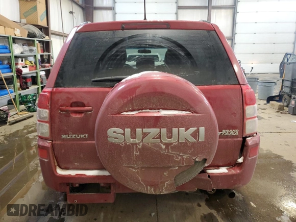 2012 Suzuki Grand Vitara Limited z VIN JS3TD0D7XC4101053, wystawiony jako Copart lot #44327615 z przebiegiem 272 451 mil mil oraz Szkoda całkowita • Salvage title. Historia ofert i sprzedaży dostępna na DreamBid. Obrazek 6.