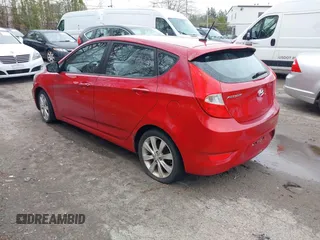 2012 Hyundai Accent SE with VIN KMHCU5AE8CU018361, listed as a IAAI auction lot 42050938 with 133,688 mi miles. Bid and sale history available at carsss.com. Image 3.