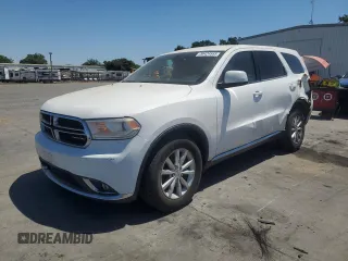 2015 Dodge Durango SXT with VIN 1C4RDJAG2FC240140, listed as a Copart auction lot 56424555 with 239,250 mi miles and Salvage title. Bid and sale history available at DreamBid. Image 1.