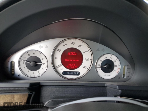 2005 Mercedes-Benz E 5.0L with VIN WDBUF70J45A761468, listed as a Copart auction lot 49500225 with 91,692 mi miles and Salvage Title. Bid and sale history available at carsss.com. Image 9.