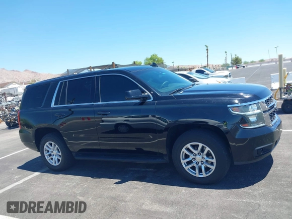 2015 Chevrolet Tahoe Commercial z VIN 1GNLC2EC0FR629983, wystawiony jako IAAI lot #42825604 z przebiegiem 112 410 mil mil oraz . Historia ofert i sprzedaży dostępna na DreamBid. Obrazek 13.
