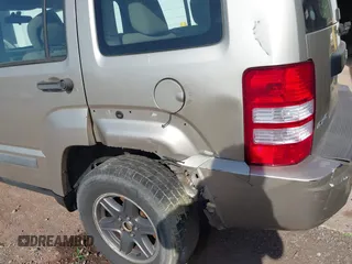 2010 Jeep Liberty Sport with VIN 1J4PN2GK0AW149679, listed as a IAAI auction lot 41874314 with 178,879 mi miles. Bid and sale history available at carsss.com. Image 6.