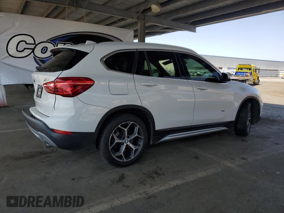 2017 BMW X1 xDrive28i with VIN WBXHT3C35H5F73546, listed as a Copart auction lot 59544545 with 125,185 mi miles and Salvage title. Bid and sale history available at DreamBid. Image 3.