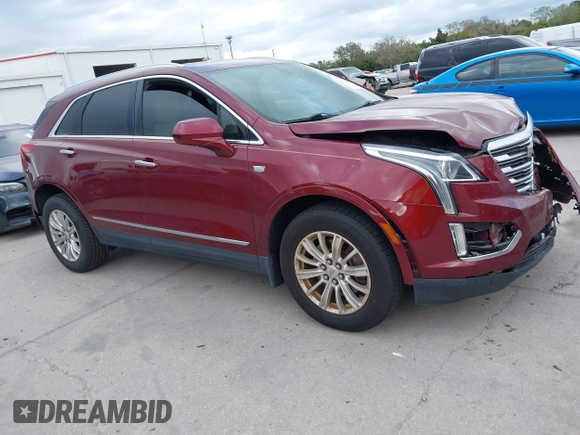2017 Cadillac XT5 FWD with VIN 1GYKNARS2HZ107587, listed as a IAAI auction lot 41614842 with 124,611 mi miles and . Bid and sale history available at carsss.com. Image 13.