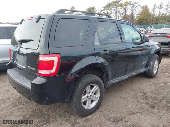 2008 Ford Escape Hybrid with VIN 1FMCU59H08KA59214, listed as a IAAI auction lot 41628625 with 999,999 mi miles. Bid and sale history available at carsss.com. Image 4.