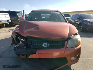 2007 Kia Spectra with VIN KNAFE162X75009714, listed as a Copart auction lot 69094894 with 206,173 mi miles and Salvage Title. Bid and sale history available at carsss.com. Image 5.