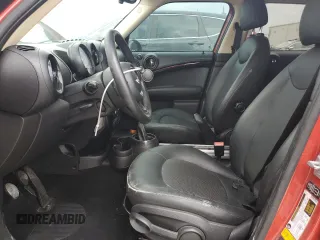 2014 MINI Countryman z VIN WMWZB3C56EWM32118, wystawiony jako Copart lot #59548875 z przebiegiem 103 833 mil mil oraz Szkoda całkowita • Salvage title. Historia ofert i sprzedaży dostępna na DreamBid. Obrazek 7.