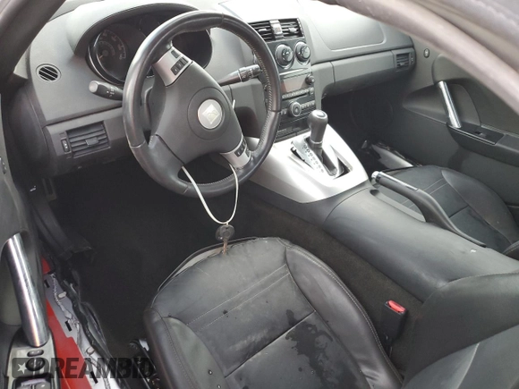 2009 Saturn Sky z VIN 1G8MN35B79Y103875, wystawiony jako Copart lot #74669844 z przebiegiem Nie podano mil oraz Szkody całkowita. Historia ofert i sprzedaży dostępna na DreamBid. Obrazek 8.
