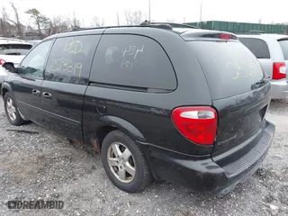 2006 Dodge Grand Caravan SXT with VIN 2D4GP44L16R616863, listed as a IAAI auction lot 41927585 with 999,999 mi miles. Bid and sale history available at carsss.com. Image 3.