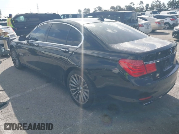 2012 BMW 7 Series 740i with VIN WBAKA4C5XCDS99253, listed as a IAAI auction lot 41710171 with 176,907 mi miles. Bid and sale history available at carsss.com. Image 3.