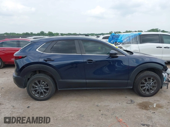 2021 Mazda CX-30 S with VIN 3MVDMAAL4MM302042, listed as a IAAI auction lot 42288275 with 39,821 mi miles and . Bid and sale history available at DreamBid. Image 14.